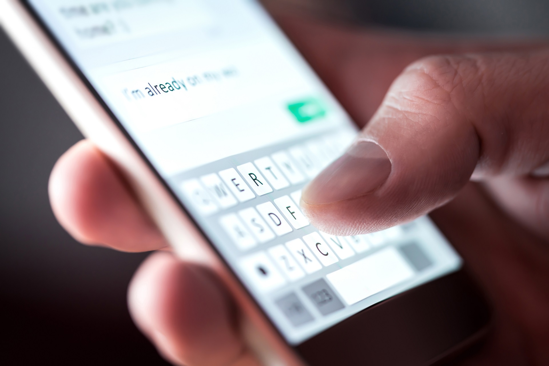A Person Typing On A Cell Phone | Law Offices Of David M. Wallin